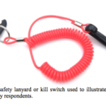 Kill Switch used by ABYC / Design Research Engineering to illustrate what a safety lanyard is.