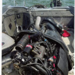 Bassmaster article outboard motor flipped in onto rear deck