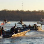 Chris Lane waves to the crowd during Bassmaster Classic 2016 Day 2 blastoff