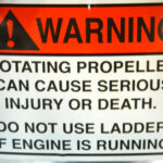 Propeller Warning Decal on pontoon boat - square