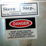 Propeller warning on pontoon boat at 2013 Tulsa Boat Show along with TM & Patent Label